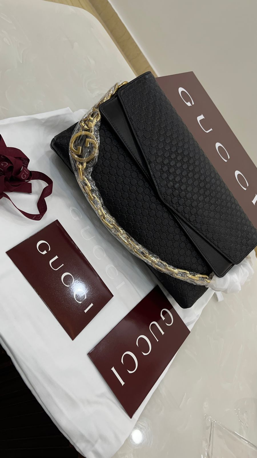 Gucci black embossed leather shoulder bag