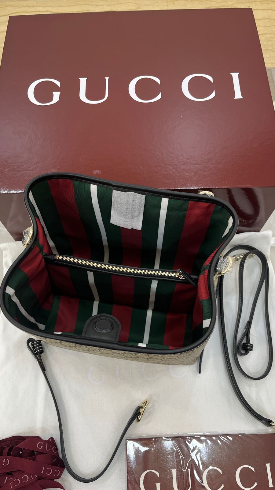 Gucci GG Emblem bucket bag
