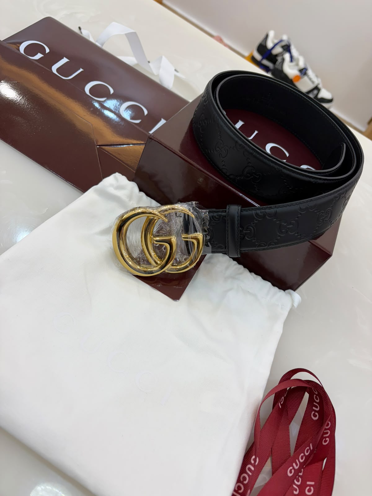 Gucci Black Embossed Logo Belt