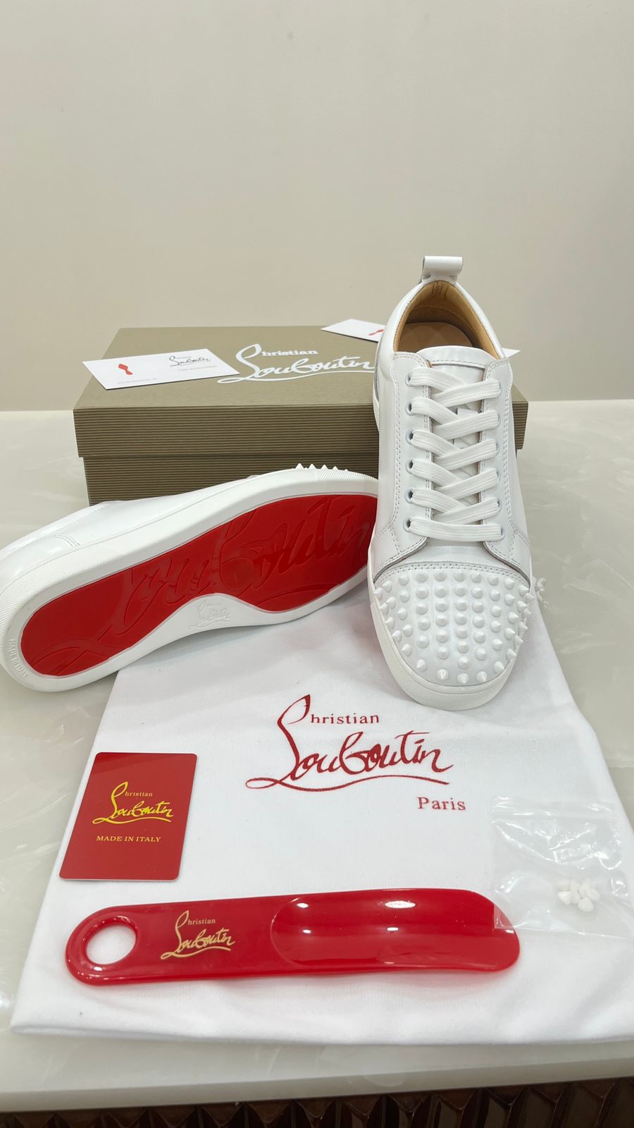 White Christian Louboutin sneakers